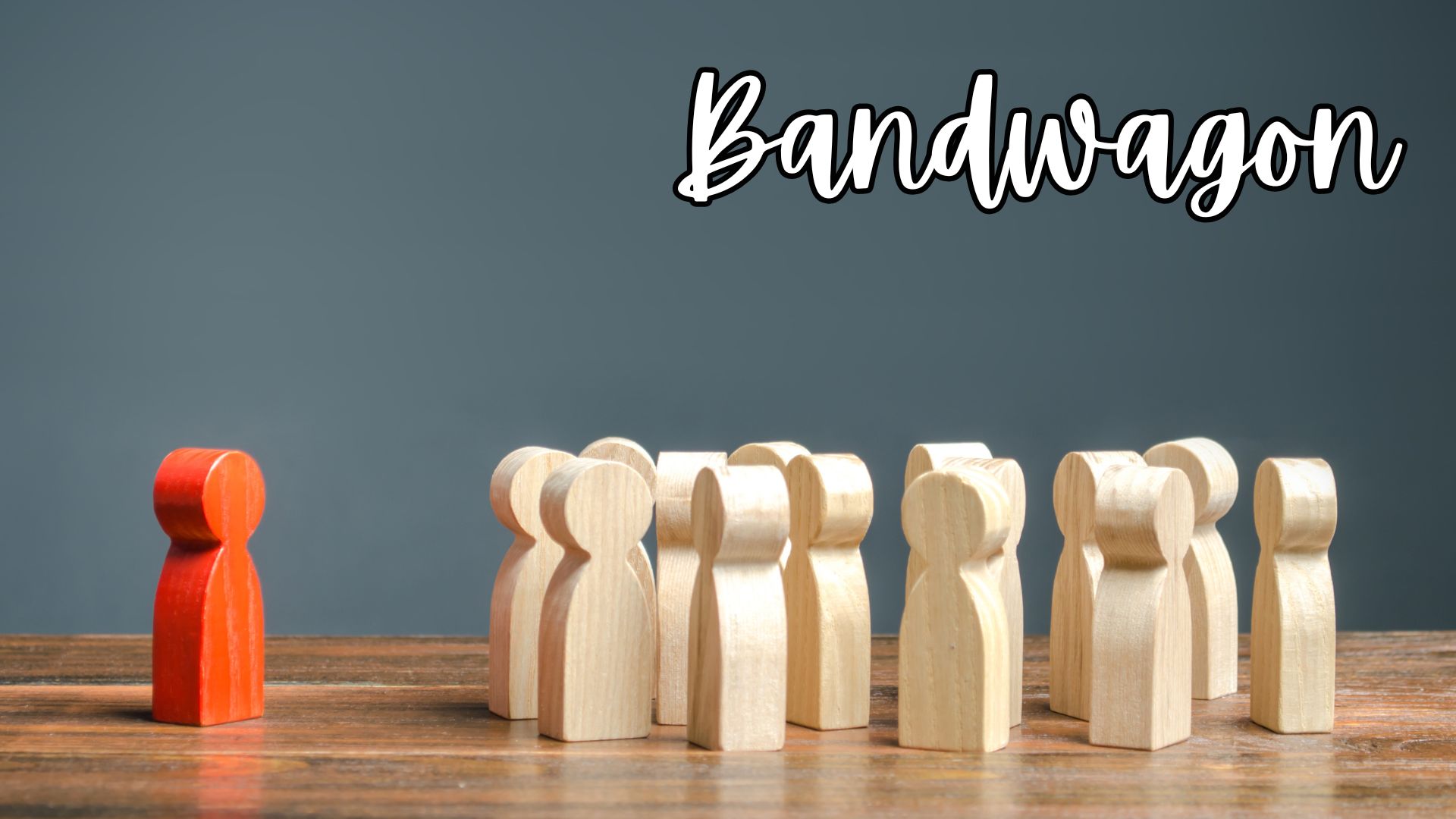 image of a red, wooden person and a group of tan, wooden people to represent the logical fallacy bandwagon fallacy.